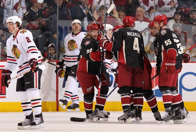 GLENDALE, AZ - MARCH 20:  Lee Stempniak #22 of the Phoenix Coyotes celebrates with teammates Zbynek Michalek #4, Ed Jovanovski #55 and Vernon Fiddler #38 after Stempniak scored a third period goal against the Chicago Blackhawks during the NHL game at Jobing.com Arena on March 20, 2010 in Glendale, Arizona.  The Coyotes defeated the Blackhawks 5-4 in an overtime shootout.  (Photo by Christian Petersen/Getty Images)