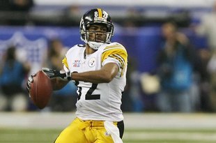 DETROIT - FEBRUARY 05:  Wide receiver Antwaan Randle El #82 sets to throw a touchdown pass to wide receiver Hines Ward #86 of the Pittsburgh Steelers in the fourth quarter against the Seattle Seahawks in Super Bowl XL at Ford Field on February 5, 2006 in Detroit, Michigan.  (Photo by Harry How/Getty Images)