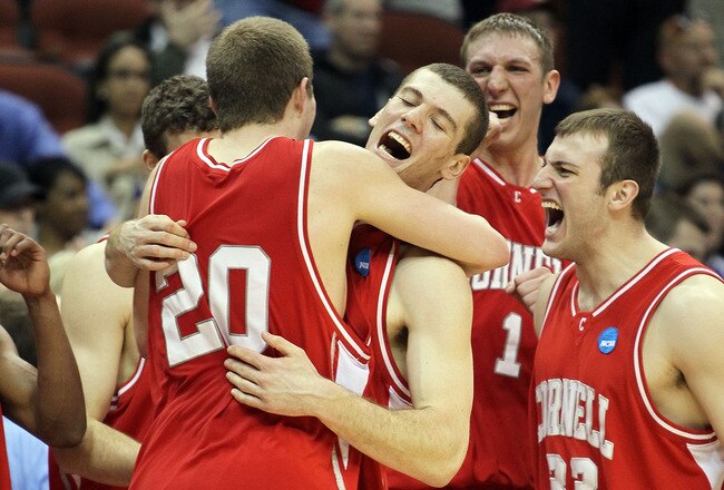 JACKSONVILLE, FL - MARCH 21:  Ryan Wittman #20, Jon Jaques #25, Jeff Foote #1 and Alex Taylor #33 of the Cornell Big Red celebrate after defeating the Wisconsin Badgers during the second round of the 2010 NCAA men's basketball tournament at Jacksonville Veteran's Memorial Arena on March 21, 2010 in Jacksonville, Florida.  (Photo by Andy Lyons/Getty Images)