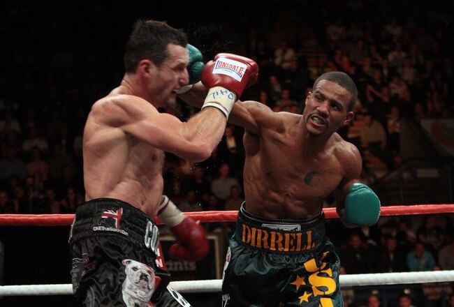 NOTTINGHAM, ENGLAND - OCTOBER 17:  Carl Froch (L) is caught by a right cross in his title against Andre Dirrell during their WBC Super Middleweight fight on October 17, 2009 at Trent FM Arena in Nottingham, England.  (Photo by John Gichigi/Getty Images)