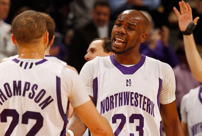 INDIANAPOLIS - MARCH 11:  Guard Jeremy Nash #23 of the Northwestern Wildcats celebrates a play with guard Michael Thompson #22 during the game against the Indiana Hoosiers in the first round of the Big Ten Men's Basketball Tournament at Conseco Fieldhouse on March 11, 2010 in Indianapolis, Indiana.  (Photo by Jonathan Daniel/Getty Images)