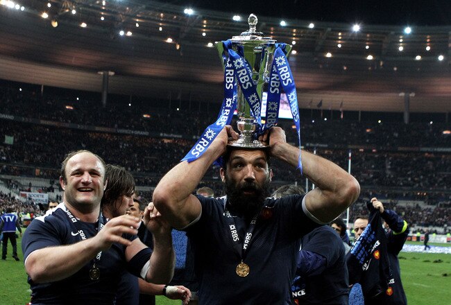 PARIS - MARCH 20:  Sebastien Chabal of France holds the trophy with team mate William Servat after France completed the Grand Slam during the RBS Six Nations Championship match between France and England at the Stade de France on March 20, 2010 in Paris, France.  (Photo by David Rogers/Getty Images)