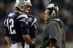 FOXBORO, MA - NOVEMBER 22:  Tom Brady #12 of the New England Patriots talks with head coach Bill Belichick in fourth quarter against the New York Jets on November 22, 2009 at Gillette Stadium in Foxboro, Massachusetts. The Patriots defeated the Jets 31-14.  (Photo by Elsa/Getty Images)