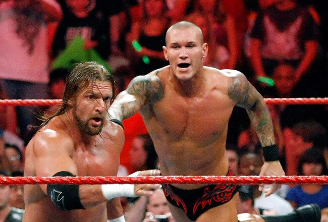 LAS VEGAS - AUGUST 24:  Wrestlers Triple H (L) and Randy Orton compete during the WWE Monday Night Raw show at the Thomas & Mack Center August 24, 2009 in Las Vegas, Nevada.  (Photo by Ethan Miller/Getty Images)