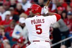 ST. LOUIS , MO - OCTOBER 10:  :  :  Albert Pujols #5 of the St. Louis Cardinals in Game Three of the NLDS during the 2009 MLB Playoffs at Busch Stadium on October 10, 2009 in St. Louis, Missouri.  (Photo by Ronald Martinez/Getty Images)