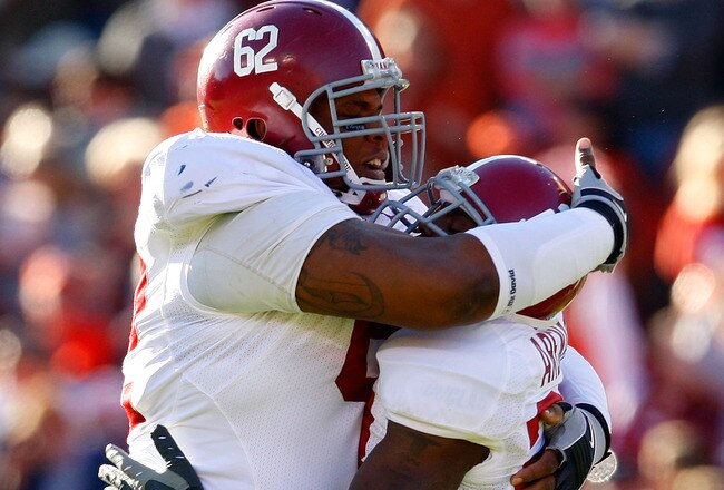AUBURN, AL - NOVEMBER 27:  Terrence Cody #62 of the Alabama Crimson Tide congratulates Javier Arenas #28 after Arenas' sack against the Auburn Tigers at Jordan-Hare Stadium on November 27, 2009 in Auburn, Alabama.  (Photo by Kevin C. Cox/Getty Images)