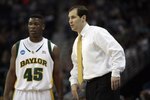 NEW ORLEANS - MARCH 20:  Tweety Carter #45 of the Baylor Bears talks with coach Scott Drew during the second round of the 2010 NCAA men's basketball tournament at the New Orleans Arena on March 20, 2010 in New Orleans, Louisiana.  (Photo by Dave Martin/Getty Images) 
