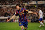ZARAGOZA, SPAIN - MARCH 21:  Lionel Messi of Barcelona celebrates after scoring his team's first goal during the La Liga match between Real Zaragoza and Barcelona at La Romareda stadium on March 21, 2010 in Zaragoza, Spain.  (Photo by Denis Doyle/Getty Images)
