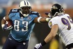 NASHVILLE, TN - JANUARY 10:  Tight end Alge Crumpler #83 of the Tennessee Titans uses a stiff arm on linebacker Jarret Johnson #95 of the Baltimore Ravens in the first quarter during the AFC Divisional Playoff Game on January 10, 2009 at LP Field in Nashville, Tennessee.  (Photo by Andy Lyons/Getty Images)