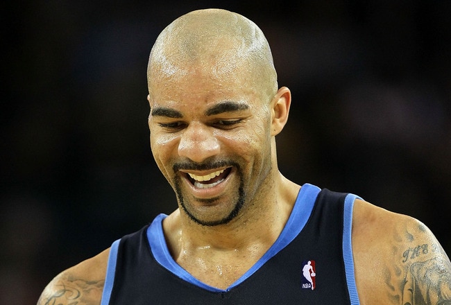 OAKLAND, CA - FEBRUARY 19:  Carlos Boozer #5 of the Utah Jazz looks on against the Golden State Warriors during an NBA game at Oracle Arena at Oracle Arena on February 19, 2010 in Oakland, California.  NOTE TO USER: User expressly acknowledges and agrees that, by downloading and/or using this Photograph, user is consenting to the terms and conditions of the Getty Images License Agreement.  (Photo by Jed Jacobsohn/Getty Images)