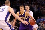 OKLAHOMA CITY - MARCH 20:  Marc Sonnen #23 of the Northern Iowa Panthers drives against Cole Aldrich #45 of the Kansas Jayhawks during the second round of the 2010 NCAA men's basketball tournament at Ford Center on March 20, 2010 in Oklahoma City, Oklahoma.  (Photo by Ronald Martinez/Getty Images)