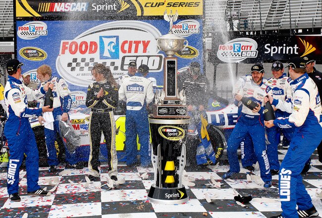 BRISTOL, TN - MARCH 21:  Jimmie Johnson (R), driver of the #48 Lowe's Chevrolet, celebrates with crew chief Chad Knaus (L) in Victory Lane after winning the NASCAR Sprint Cup Series Food City 500 at Bristol Motor Speedway on March 21, 2010 in Bristol, Tennessee.  (Photo by Geoff Burke/Getty Images for NASCAR)