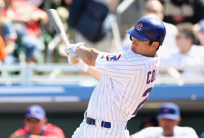 MESA, AZ - MARCH 04:  Tyler Colvin #21 of the Chicago Cubs hits a double against the Oakland Athletics during the MLB spring training game at HoHoKam Park on March 4, 2009 in Mesa, Arizona. The Cubs defeated the A's 9-3.  (Photo by Christian Petersen/Getty Images)