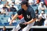TAMPA, FL - MARCH 5: Phil Hughes #65 of the New York Yankees pitches against the Tampa Bay Rays March 5, 2010 at the George M. Steinbrenner  Field in Tampa, Florida. (Photo by Al Messerschmidt/Getty Images) 