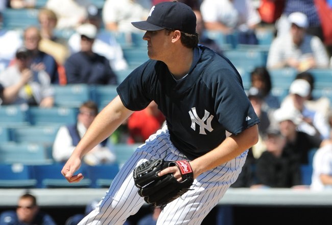 TAMPA, FL - MARCH 5: Phil Hughes #65 of the New York Yankees pitches against the Tampa Bay Rays March 5, 2010 at the George M. Steinbrenner  Field in Tampa, Florida. (Photo by Al Messerschmidt/Getty Images) 