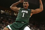 PROVIDENCE, RI - MARCH 18:  DeVaughn Washington #1 of the Ohio Bobcats celebrates his dunk in the second half against the Georgetown Hoyas during the first round of the 2010 NCAA men's basketball tournament on March 18, 2010 at the Dunkin Donuts Arena in Providence, Rhode Island. Ohio defeated Georgetown 97-83.  (Photo by Elsa/Getty Images)