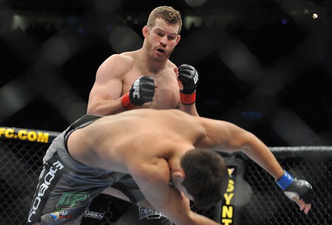 PORTLAND, OR - AUGUST 29:  UFC fighter Nate Marquardt (L) knocks out UFC fighter Demian Maia (R) during their Middleweight bout at UFC 102:  Couture vs. Nogueira at the Rose Garden Arena on August 29, 2009 in Portland, Oregon.  (Photo by Jon Kopaloff/Getty Images)