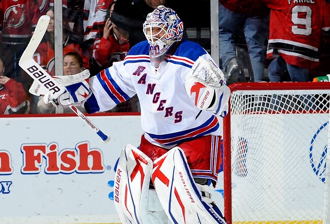 NEWARK, NJ - MARCH 25:  Henrik Lundqvist #30 of the New York Rangers celebrates in win over the New Jersey Devils at the Prudential Center on March 25, 2010 in Newark, New Jersey.  The Rangers won 4-3 in a shootout. (Photo by Jeff Zelevansky/Getty Images)