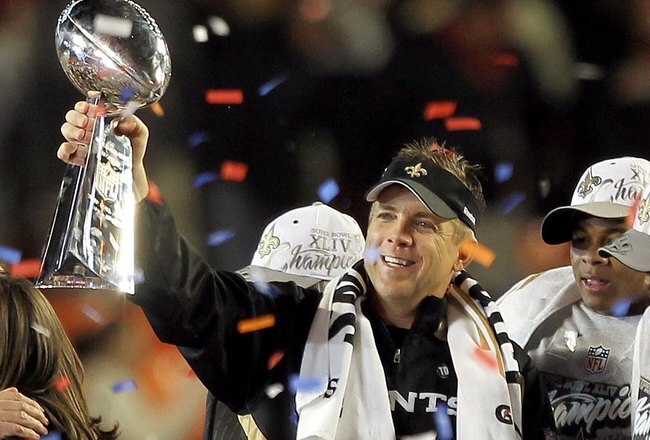 MIAMI GARDENS, FL - FEBRUARY 07:  Head coach Sean Payton of the New Orleans Saints celebrates with the Vince Lombardi Trophy after his team defeated the Indianapolis Colts during Super Bowl XLIV on February 7, 2010 at Sun Life Stadium in Miami Gardens, Florida.  (Photo by Ezra Shaw/Getty Images)