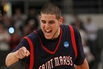 PROVIDENCE, RI - MARCH 20:  Omar Samhan #50 of the Saint Mary's Gaels celebrates after the win over the Villanova Wildcats during the second round of the 2010 NCAA men's basketball tournament on March 20, 2010 at the Dunkin Donuts Center in Providence, Rhode Island. The Gaels defeated the Wildcats 75-68.  (Photo by Elsa/Getty Images)