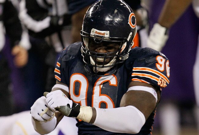 CHICAGO - DECEMBER 28: Alex Brown #96 of the Chicago Bears celebrates a sack of Brett Favre of the Minnesota Vikings at Soldier Field on December 28, 2009 in Chicago, Illinois. The Bears defeated the Vikings 36-30 in overtime. (Photo by Jonathan Daniel/Getty Images)