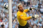 MANCHESTER, ENGLAND - SEPTEMBER 12:   Manuel Almunia of Arsenal concedes an own goal as he heads the ball into his own net after it rebounded off the post and hit him during the Barclays Premier League match between Manchester City and Arsenal at the City of Manchester Stadium on September 12, 2009 in Manchester, England. (Photo by Shaun Botterill/Getty Images)