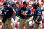 ANAHEIM, CA - JUNE 14:  (L-R) Kevin Kouzmanoff #5, Adrian Gonzalez #23, manager Bud Black and Henry Blanco #28 of the San Diego Padres wait for pitcher Greg Burke (not pictured) to enter the game in the fifth inning against the Los Angeles Angels of Anaheim at Angel Stadium on June 14, 2009 in Anaheim, California. The Angels defeated the Padres 6-0.  (Photo by Jeff Gross/Getty Images)
