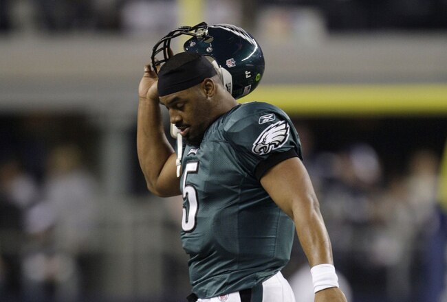ARLINGTON, TX - JANUARY 9:  Quarterback Donovan McNabb #5 of the Philadelphia Eagles walks off the field after not converting on fourth down in the second half during the 2010 NFC wild-card playoff game against the Dallas Cowboys at Cowboys Stadium on January 9, 2010 in Arlington, Texas. (Photo by Jamie Squire/Getty Images)