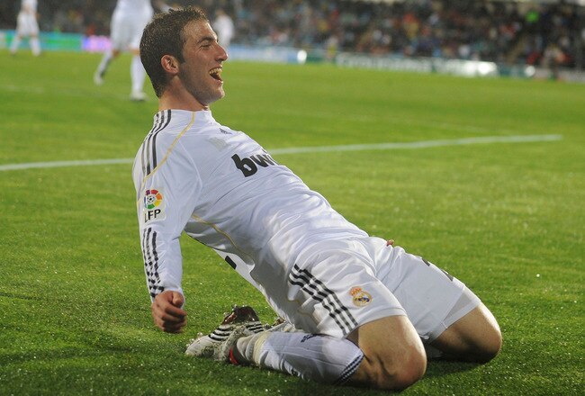 GETAFE, SPAIN - MARCH 25:  Gonzalo Higuain of Real Madrid celebrates after scoring his 2nd goal during La Liga match between Getafe and Real Madrid at the Coliseum Alfonso Perez stadium on March 25, 2010 in Getafe, Spain.  (Photo by Denis Doyle/Getty Images)