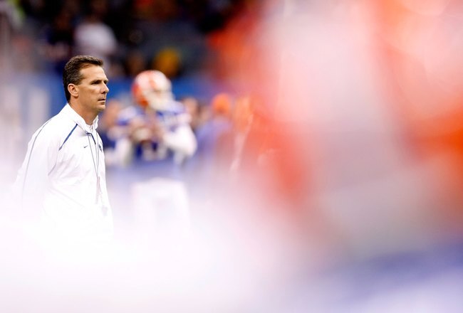 NEW ORLEANS - JANUARY 01:  Head coach Urban Meyer of the Florida Gators stands on the field before the Allstate Sugar Bowl against the Cincinnati Bearcats at the Louisana Superdome on January 1, 2010 in New Orleans, Louisiana.  (Photo by Kevin C. Cox/Getty Images)
