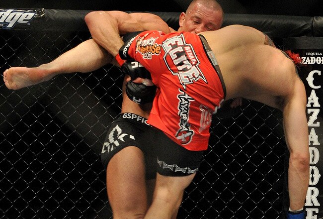 NEWARK, NJ - MARCH 27:  UFC fighter Georges St-Pierre (L) battles Dan Hardy (R) during their Welterweight title bout at UFC 111 at the Prudential Center on March 27, 2010 in Newark, New Jersey.  (Photo by Jon Kopaloff/Getty Images)