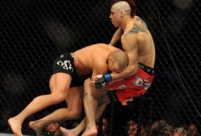 NEWARK, NJ - MARCH 27:  UFC fighter Georges St-Pierre (L) battles Dan Hardy (R) during their Welterweight title bout at UFC 111 at the Prudential Center on March 27, 2010 in Newark, New Jersey.  St-Pierre won by Unanimous Decision at 5:00 of the 5th round.  (Photo by Jon Kopaloff/Getty Images)