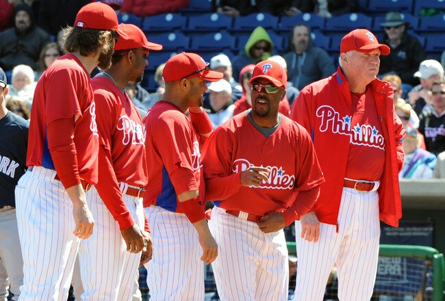 CLEARWATER, FL - FEBRUARY 25: Infielder Jimmy Rollins #11 of the Philadelphia Phillies lines up during pre-game ceremonies before play against the New York Yankees March 4, 2010 at the Bright House Field in Clearwater, Florida. (Photo by Al Messerschmidt/Getty Images)