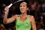KEY BISCAYNE, FL - MARCH 28:  Jelena Jankovic of Serbia celebrates after defeating Elena Vesnina of Russia during day six of the 2010 Sony Ericsson Open at Crandon Park Tennis Center on March 28, 2010 in Key Biscayne, Florida.  (Photo by Michael Heiman/Getty Images)
