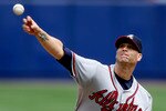 NEW YORK - APRIL 26: Tim Hudson #15 of the Atlanta Braves pitches in the first inning of a game against the New York Mets at Shea Stadium April 26, 2008 in the Flushing neighborhood of the Queens borough of New York City. (Photo by Jeff Zelevansky/Getty Images)