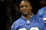 DETROIT - DECEMBER 23:  Barry Sanders #20 former Detroit Lions running back looks on from the tunnel prior to being honored at half time during a game against the Kansas City Chiefs on December 23, 2007 at Ford Field in Detroit, Michigan. (Photo By Gregory Shamus/Getty Images)