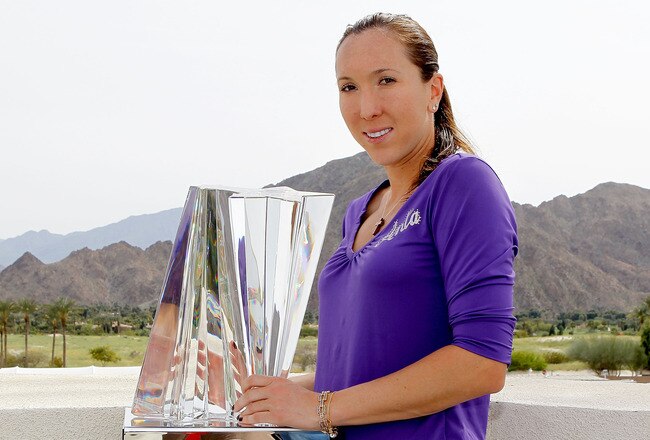INDIAN WELLS, CA - MARCH 21:  Jelena Jankovic of Serbia poses for photographers after defeating Caroline Wozniacki of Denmark during the final of the BNP Paribas Open on March 21, 2010 at the Indian Wells Tennis Garden in Indian Wells, California.  (Photo by Matthew Stockman/Getty Images)