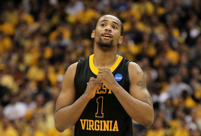 SYRACUSE, NY - MARCH 27:  Da'Sean Butler #1 of the West Virginia Mountaineers reacts in the second half the Kentucky Wildcats during the east regional final of the 2010 NCAA men's basketball tournament at the Carrier Dome on March 27, 2010 in Syracuse, New York. West Virginia won 73-66. (Photo by Jim McIsaac/Getty Images)