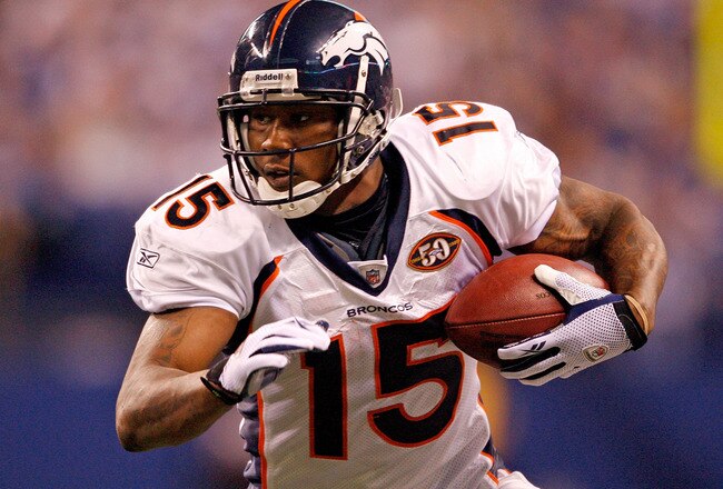 INDIANAPOLIS - DECEMBER 13: Brandon Marshall #15 of the Denver Broncos runs with the ball during the NFL game against the Indianapolis Colts at Lucas Oil Stadium on December 13, 2009 in Indianapolis, Indiana.  The Colts won 28-16.(Photo by Andy Lyons/Getty Images)