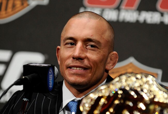 NEW YORK - MARCH 24:  Georges St-Pierre of Montreal, Quebec, Canada speaks at a press conference for UFC 111 at Radio City Music Hall on March 24, 2010 in New York City.  St-Pierre will face Dan Hardy of Nottingham UK in the Welterweight title bout. (Photo by Jeff Zelevansky/Getty Images)