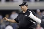 ARLINGTON, TX - JANUARY 9:  Head coach Andy Reid of the Philadelphia Eagles calls out from the sideline in the first half against the Dallas Cowboys during the 2010 NFC wild-card playoff game at Cowboys Stadium on January 9, 2010 in Arlington, Texas. (Photo by Jamie Squire/Getty Images)