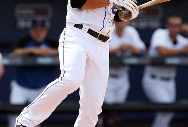 PORT ST. LUCIE, FL - MARCH 24:  Fernando Martinez #26 of the New York Mets gets hit by a pitch while facing the Houston Astros at Tradition Field on March 24, 2010 in Port St. Lucie, Florida.  (Photo by Doug Benc/Getty Images)