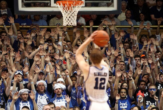 DURHAM, NC - MARCH 06:  Kyle Singler #12 of the Duke Blue Devils shoots a free throw against the North Carolina Tar Heels during their game at Cameron Indoor Stadium on March 6, 2010 in Durham, North Carolina.  (Photo by Streeter Lecka/Getty Images)