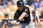 GLENDALE, AZ - MARCH 06:  Gordon Beckham #15 of the Chicago White Sox bats against the Los Angeles Dodgers during a spring training game at The Ballpark at Camelback Ranch on March 6, 2010 in Glendale, Arizona.  (Photo by Chris McGrath/Getty Images)