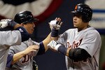 MINNEAPOLIS - OCTOBER 06:  Miguel Cabrera #24 of the Detroit Tigers is congratulated by Magglio Ordonez #30 after hitting a home run during the 3rd inning of the American League Tiebreaker game against the Minnesota Twins on October 6, 2009 at Hubert H. Humphrey Metrodome in Minneapolis, Minnesota.  (Photo by Jamie Squire/Getty Images)