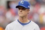 ST. LOUIS, MO - JULY 14: American League All-Star Zack Greinke of Kansas City Royals looks on during the lineup before the 2009 MLB All-Star Game at Busch Stadium on July 14, 2009 in St Louis, Missouri. (Photo by Pool/Getty Images)