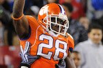 TAMPA, FL - NOVEMBER 28: Running C. J. Spiller #28 of the Clemson Tigers celebrates a touchdown run against the Georgia Tech Yellow Jackets in the 2009 ACC Football Championship Game at Raymond James Stadium on December 5, 2009 in Tampa, Florida.  (Photo by Al Messerschmidt/Getty Images)