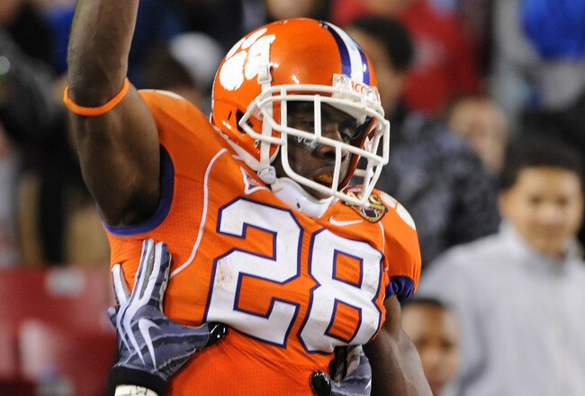 TAMPA, FL - NOVEMBER 28: Running C. J. Spiller #28 of the Clemson Tigers celebrates a touchdown run against the Georgia Tech Yellow Jackets in the 2009 ACC Football Championship Game at Raymond James Stadium on December 5, 2009 in Tampa, Florida.  (Photo by Al Messerschmidt/Getty Images)