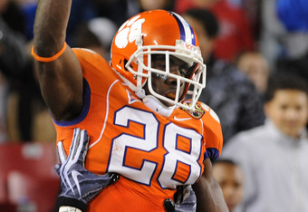 TAMPA, FL - NOVEMBER 28: Running C. J. Spiller #28 of the Clemson Tigers celebrates a touchdown run against the Georgia Tech Yellow Jackets in the 2009 ACC Football Championship Game at Raymond James Stadium on December 5, 2009 in Tampa, Florida.  (Photo by Al Messerschmidt/Getty Images)