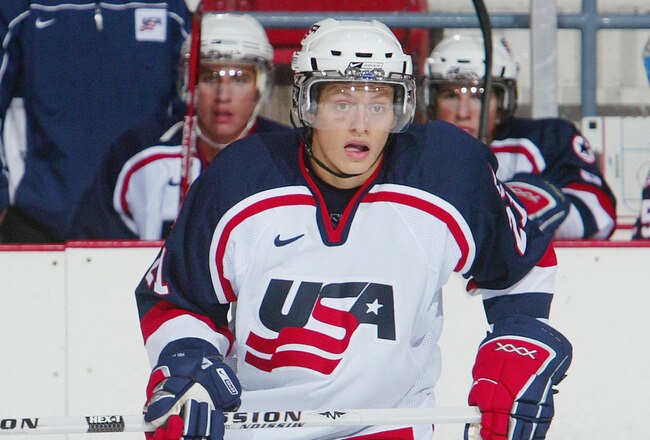 LAKE PLACID, NY - AUGUST 12:  Rhett Rakhshani #21 skates during USA Hockey's National Junior Evaluation Camp on August 12, 2006 at Herb Brooks Arena in Lake Placid, New York.(Photo by Jim McIsaac/Getty Images)